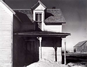 Wright Morris, Abandoned Farmhouse with Drifted Snow on Porch, Nebraska, 1941, silver print, 1975