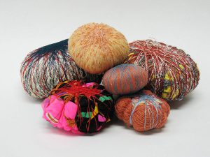 Sheila Hicks, Six Soft Stones, silk, wool, linen, monofilament, mohair, nylon, cotton, garments - wrapped, 1997