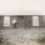 Southwest Custer CountySolomon D. Butcher, Nebraska 1892 (sod house, man, dog), black & white photograph