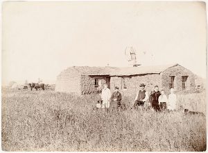 Solomon D. Butcher, Southwest Custer County, Nebraska 1892 (sod house, wood windmill, rooster windmill weight), black & white photograph, c. 1892