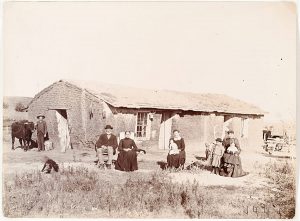 Solomon D. Butcher, Southwest Custer County, Nebraska 1892 (two dogs, bird house, elk antler), black & white photograph, c. 1892