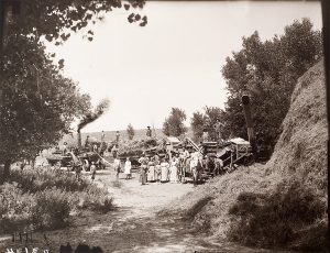 Solomon D. Butcher, Threshing on the W. Baker farm near Riverdale, Buffalo County, Nebraska, 1903 (altered), black & white photograph (from glass plate negative in the Nebraska State Historical Society Collection), c. 1982-1984